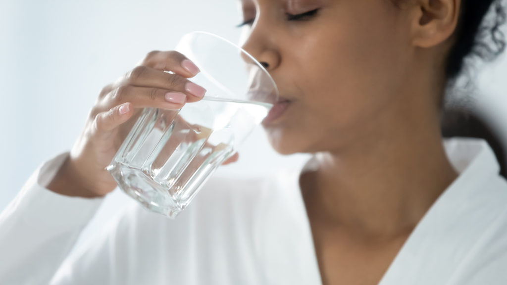 Woman drinking ventura tap water